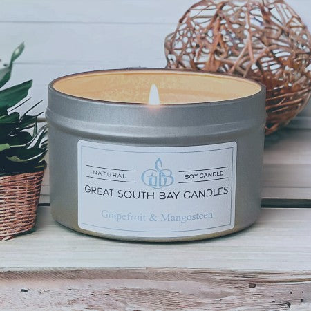 Grapefruit and Mangosteen citrus scented soy candle in silver travel tin 