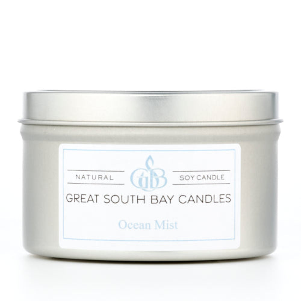 Great South Bay Candles Ocean Mist candle in a metal tin on a white background