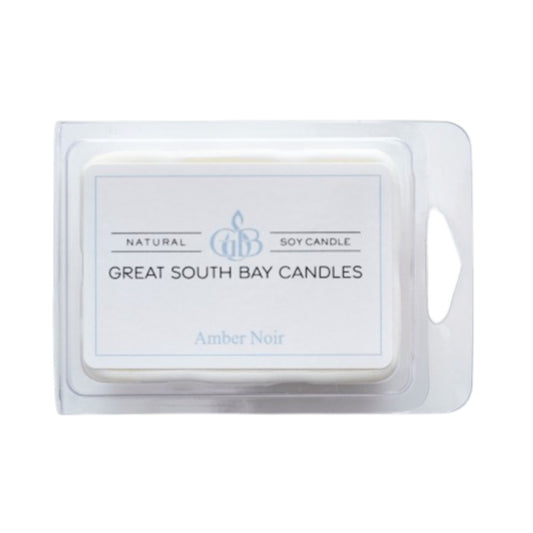 Amber Noir scented wax melts in a  package from Great South Bay Candles on a white background.