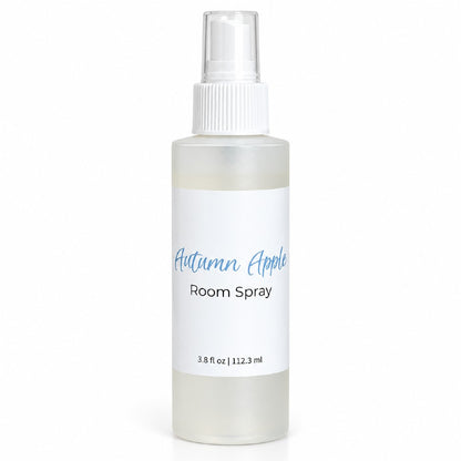 A 3.8 fl oz room spray bottle with a white spray cap and a white label that reads 'Autumn Apple' in blue script and 'Room Spray' in black text on a white background.