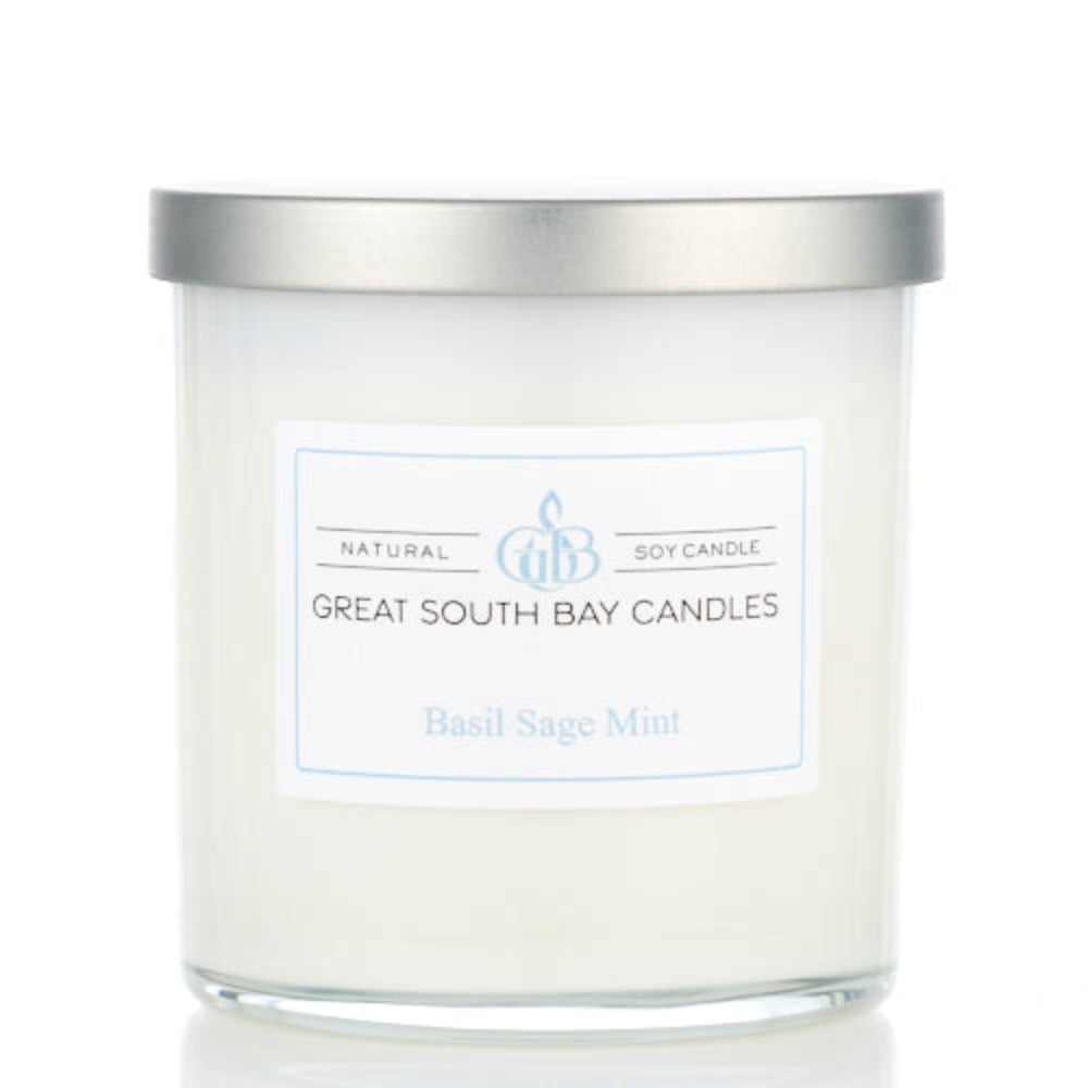 Basil Sage and Mint candle in a 8oz white tumbler with silver lid.