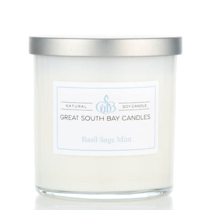 Basil Sage and Mint candle in a 8oz white tumbler with silver lid.