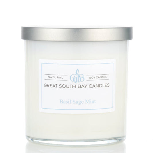 Basil Sage and Mint candle in a 8oz white tumbler with silver lid.