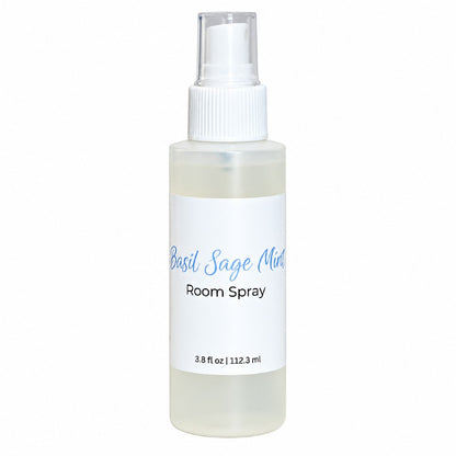 Basil sage mint room spray bottle on a white background.