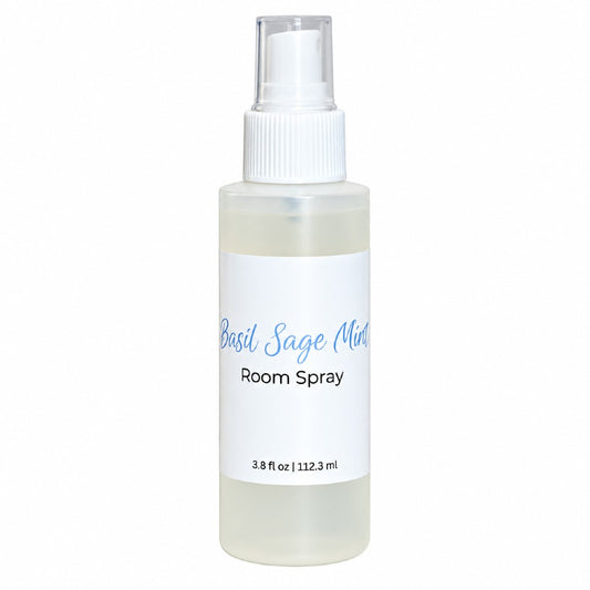 Basil sage mint room spray bottle on a white background.