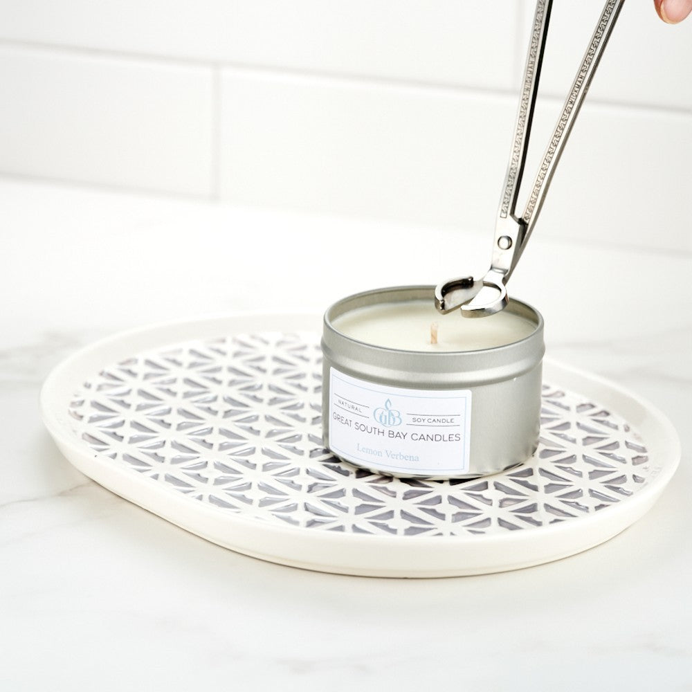 Silver candle wick trimmer to use on all candle wicks.