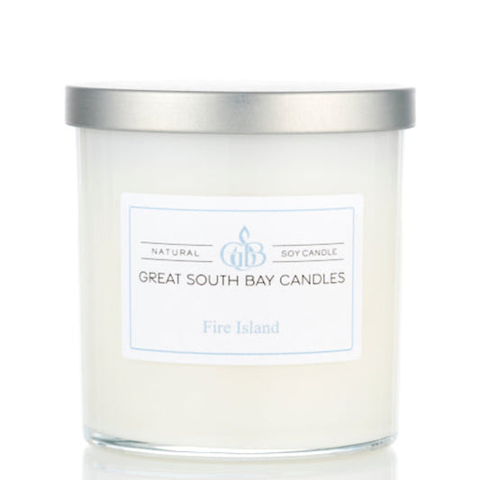 Great South Bay Candles Fire Island beach scented candle with a silver lid on a white background.