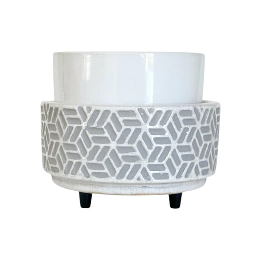 Grey and white candle wax warmer with a hexagon pattern on a white background.