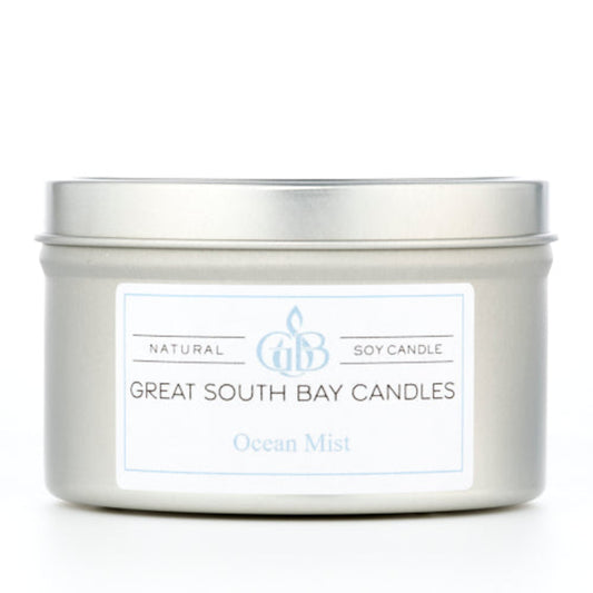 Great South Bay Candles Ocean Mist candle in a metal tin on a white background