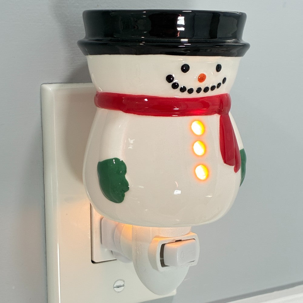 Snowman plug in candle wax warmer.