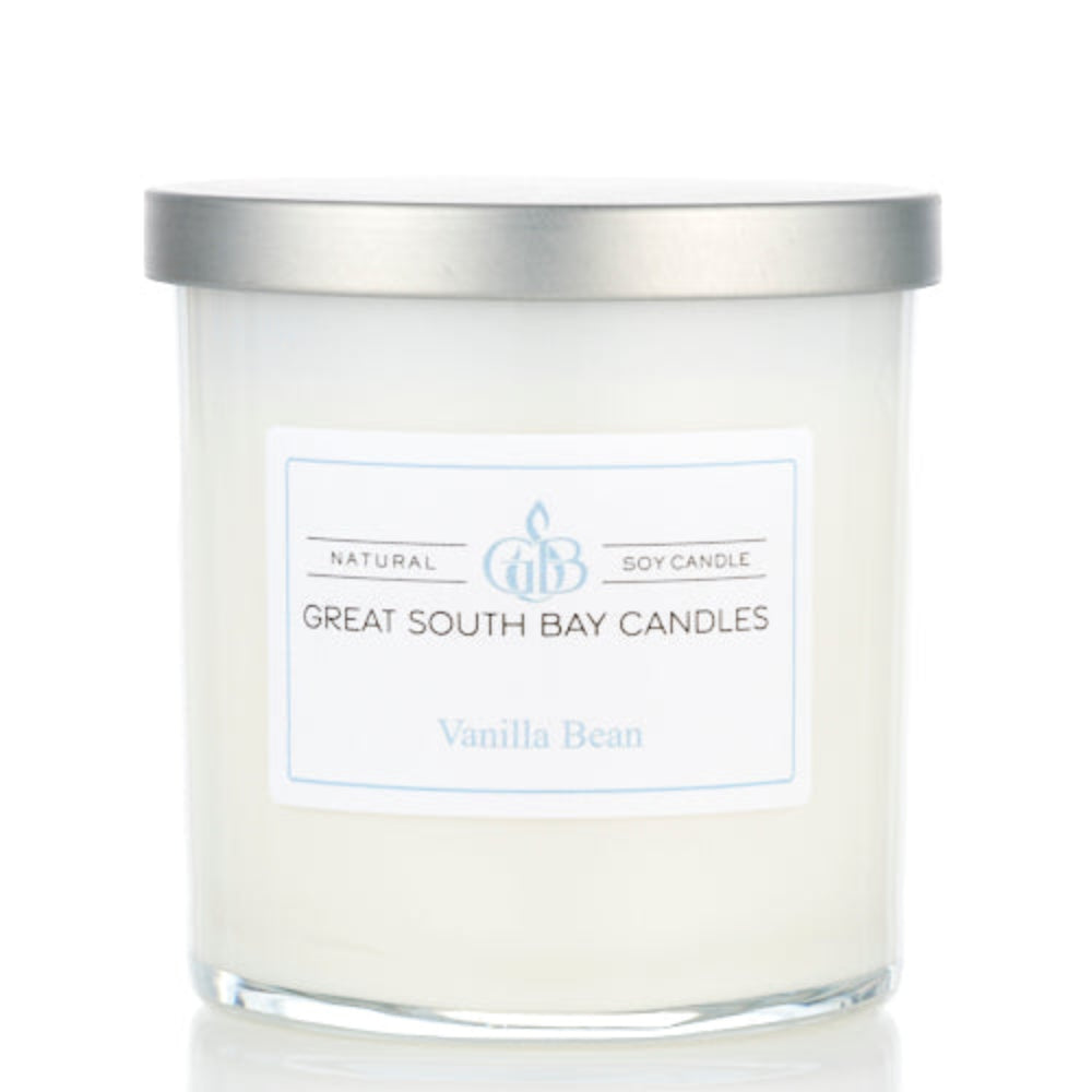 Vanilla Bean Bakery scented candle in a white glass tumbler.