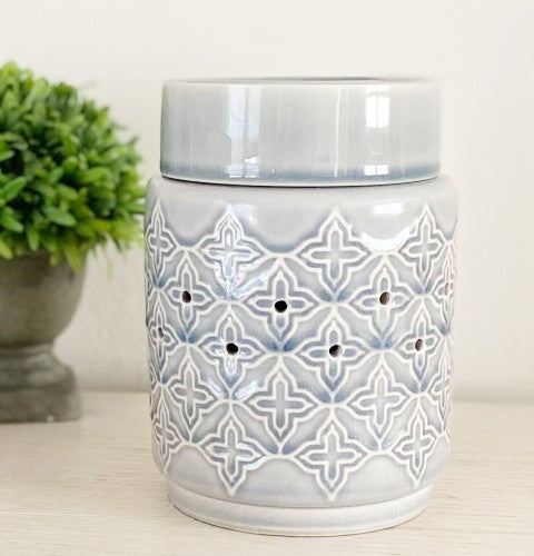 Jasmine tabletop plug in candle wax warmer for candle melts in the color grey.